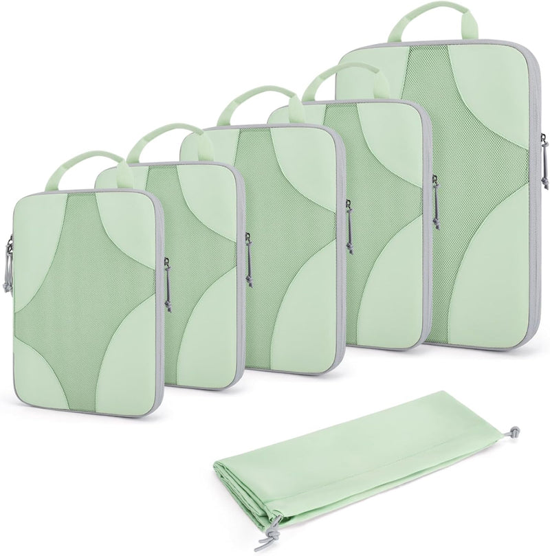 Light green packing cubes in assorted sizes with a matching slim zip pouch.