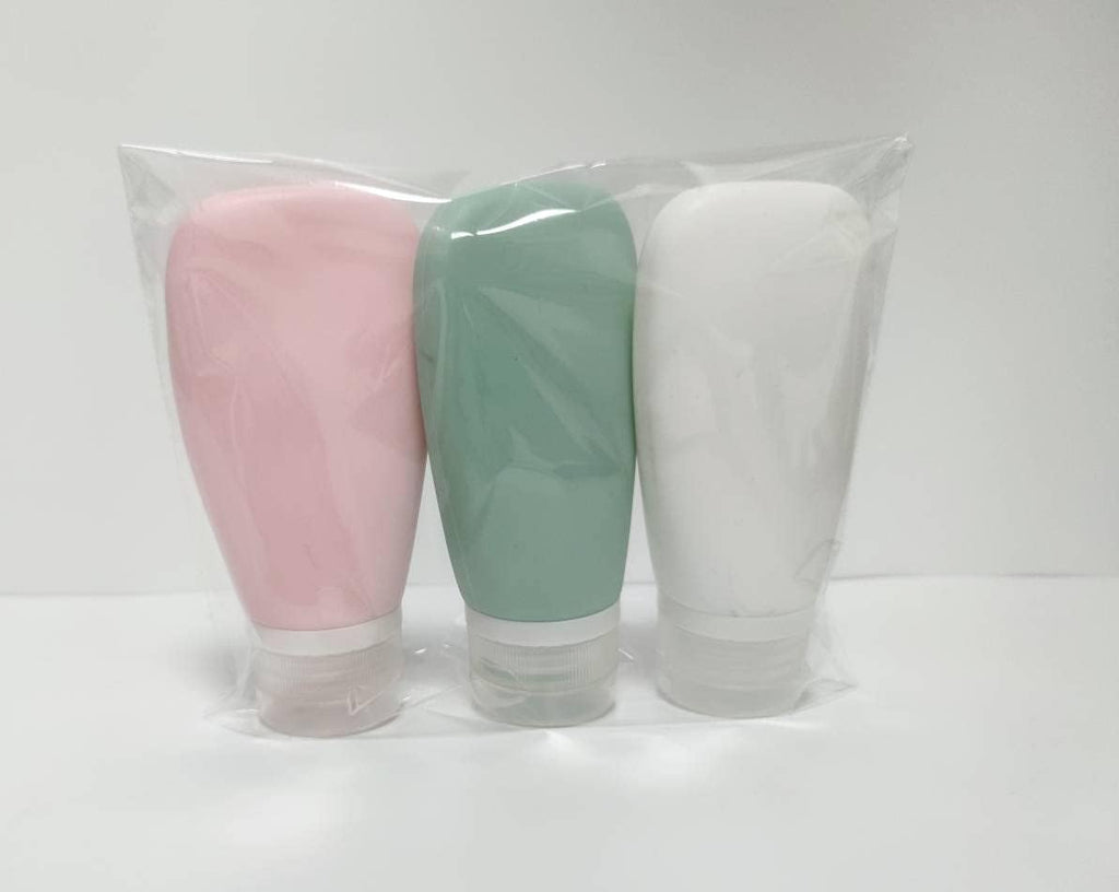 Travel Bottles for Toiletries, TSA Approved 3oz (90ml) Leak Proof Silicone Refillable Squeeze Travel Size Containers BPA Free Air Travel for Shampoo, Lotions, 3-pk (Pink-White-Teal)