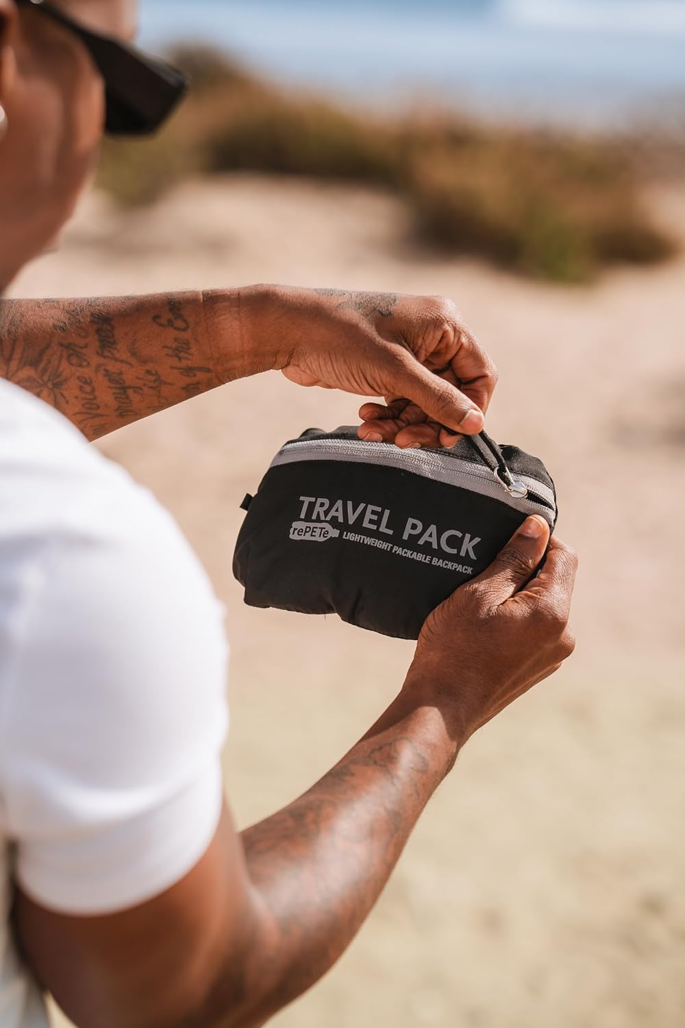 ChicoBag Travel Pack rePETe + Refine | Eco-friendly Lightweight and Packable Travel Backpack (Obsidian)