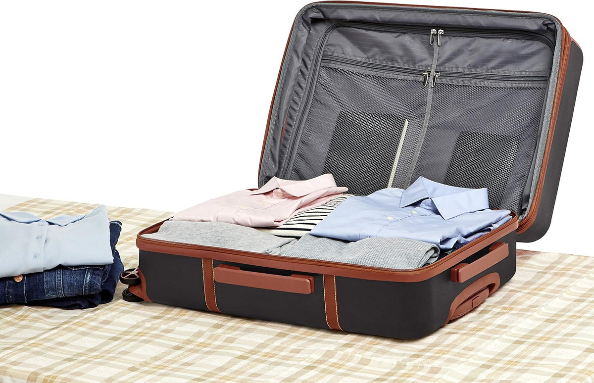 Amazon Basics 24-inch Hardside Checked Luggage With Leather Detailing, Expandable Spinner Suitcase With 4 double Wheels, Scratch-Resistant Surface, Black